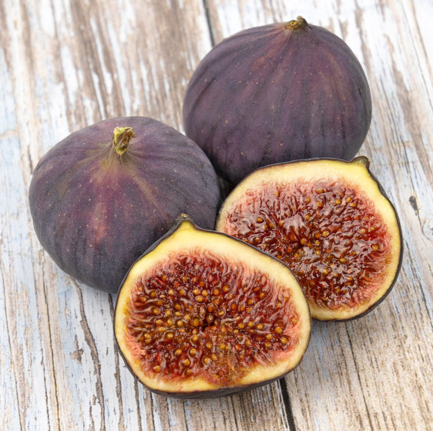 figues fraîches sur fond de bois Senteur Figuier 500 ML – Image 1